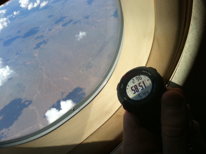 Garmin FR110 and 310XT Run Comparison Garmin FR110 on an airplane